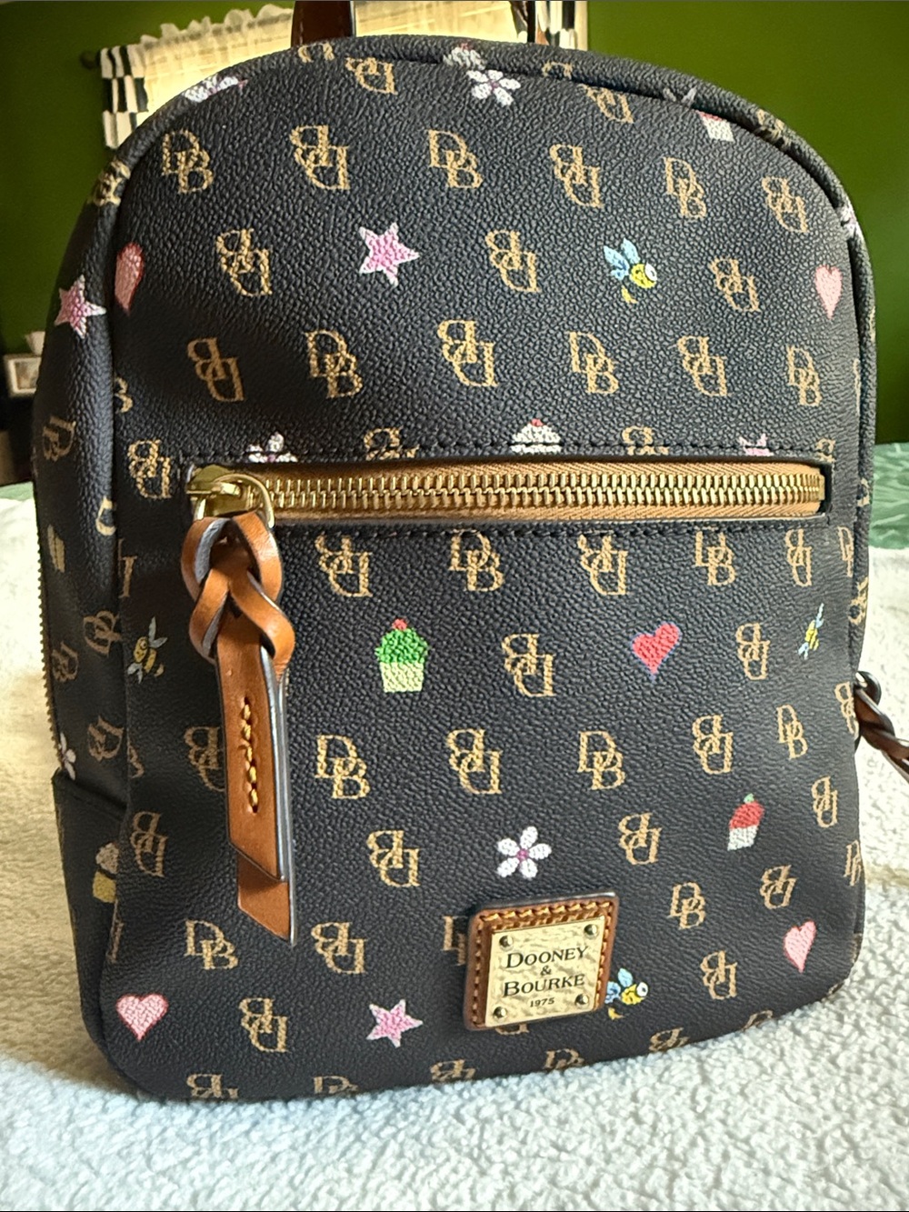 Dooney & Bourke Brown Logo Mini Backpack with Pink, Red & Green Accents